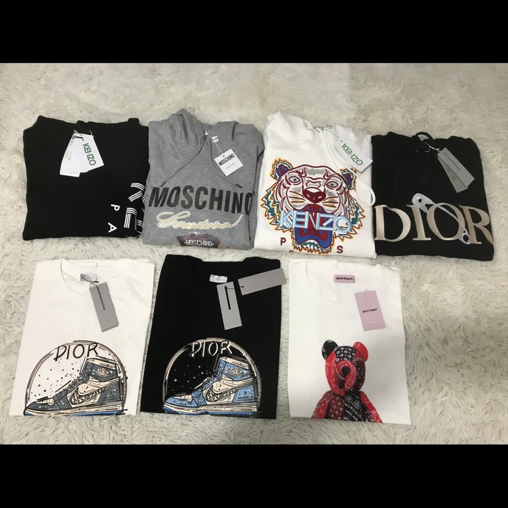 Designer T-Shirts never worn before comes with tags.